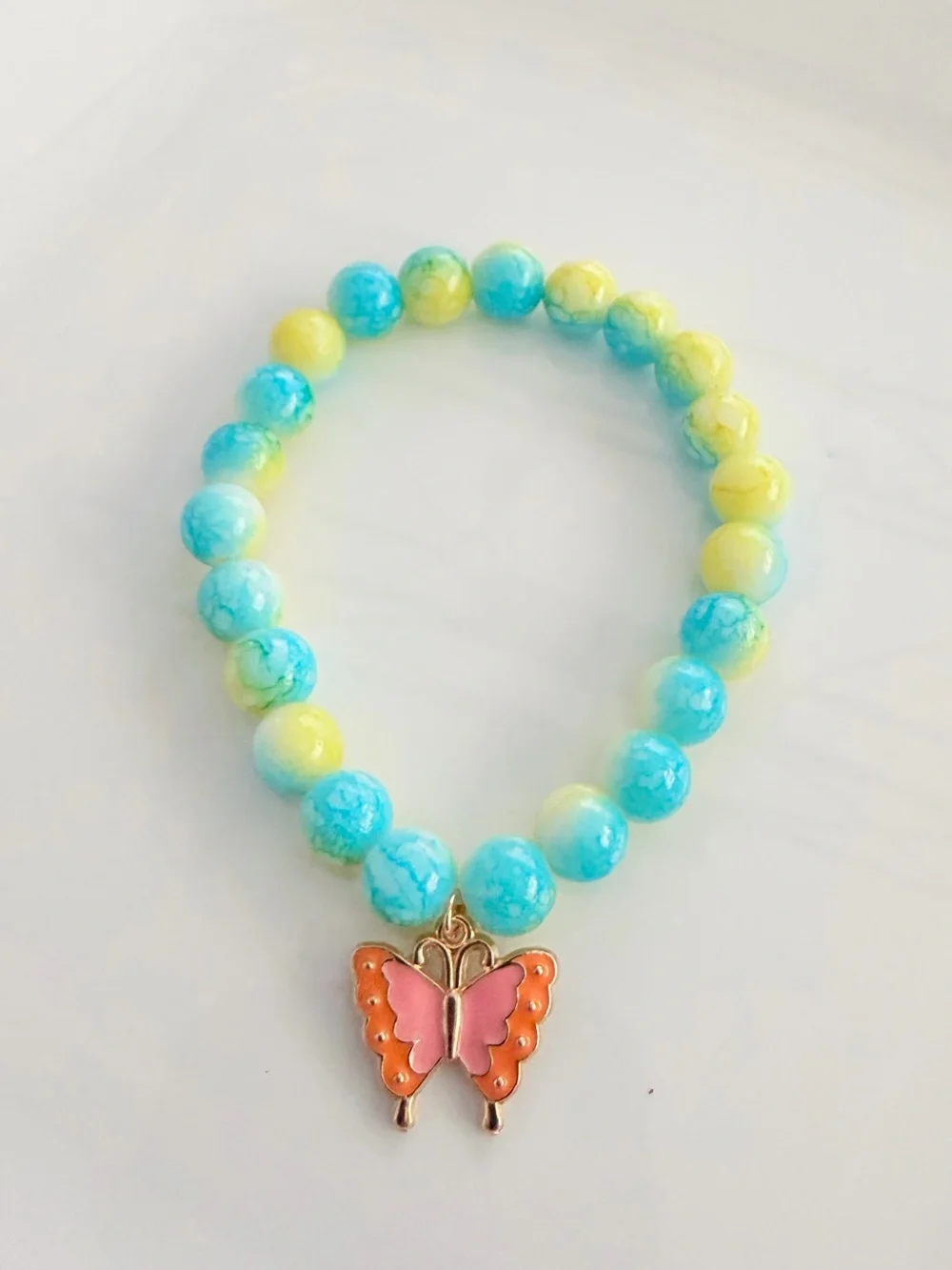 Turquoise & Yellow Beaded Bracelet with Pink Butterfly Charm